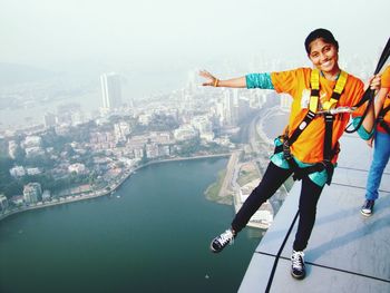 Woman standing in front of building