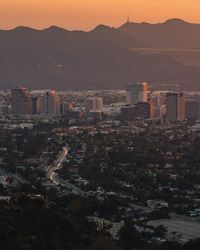 High angle view of cityscape against sky during sunset