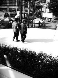 Woman standing in city