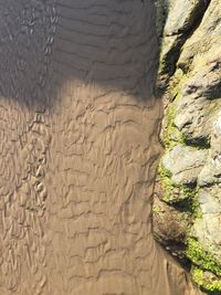 High angle view of sand at beach