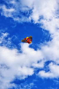 Low angle view of kite against sky