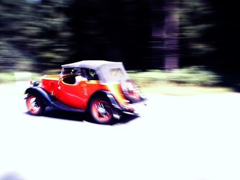 Blurred motion of vintage car