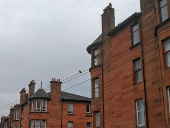 Low angle view of buildings against sky