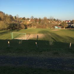 Scenic view of field against clear sky
