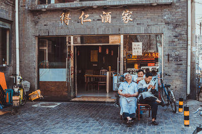 Group of people in front of building