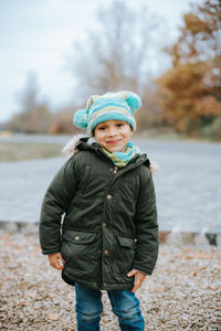 Full length of girl wearing hat during winter