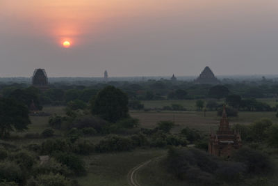 Scenic view of landscape against sky during sunset