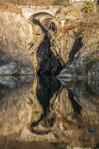 The beautiful ravine of sant'anna with the rocks reflecting on the water of the river