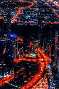 High angle view of illuminated city at night