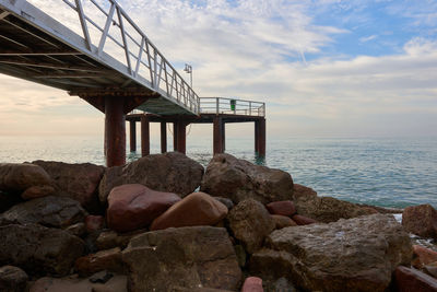 Scenic view of sea against sky at sunset