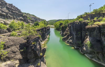 View of water flowing through rocks