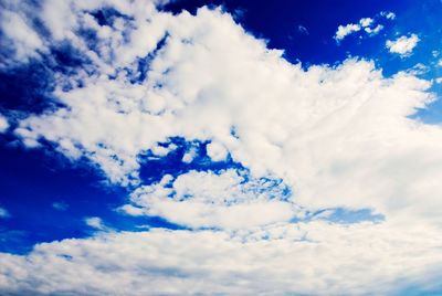 Low angle view of clouds in blue sky