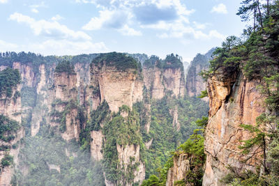 Panoramic view of rocky mountains against sky