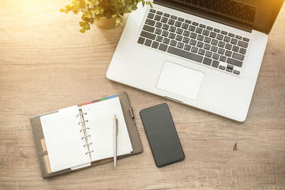 High angle view of mobile phone on table