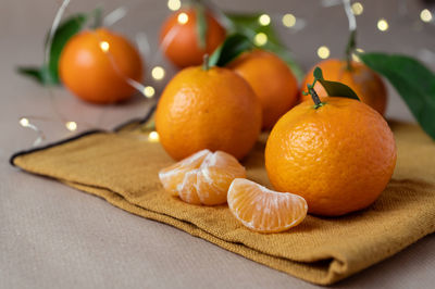 Close-up of orange fruits on table