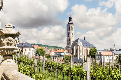 Buildings in city against sky