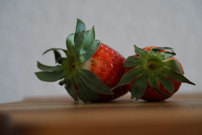Close-up of strawberry growing on table
