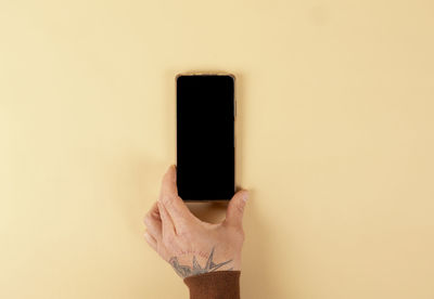 Close-up of woman against pink background