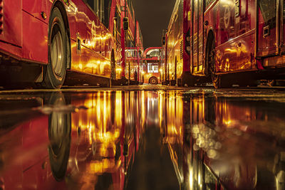 Reflection of illuminated buildings in water at night