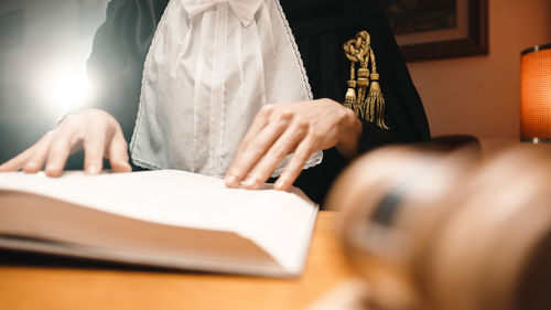 Judge skims through a book