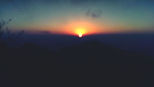 Scenic view of landscape at sunset