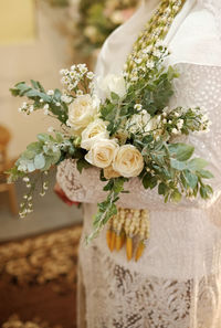 Close-up of white roses on plant