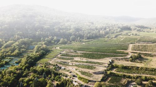High angle view of agricultural landscape against sky