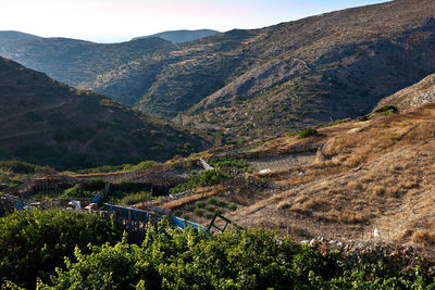 High angle view of road amidst trees and mountains
