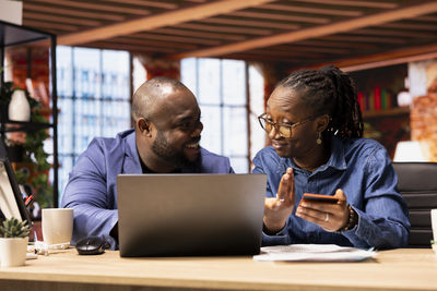 Business colleagues working at office