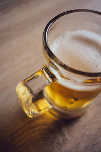 High angle view of beer glass on table