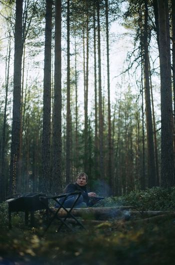 Man sitting by campire