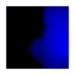 Close-up of silhouette person against blue background