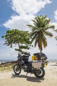 Adventure touring bike parked at the caribbean coast