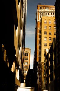 Low angle view of skyscrapers against sky