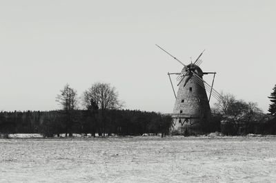 Wind turbines in field