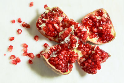Close-up of pomegranate on white background