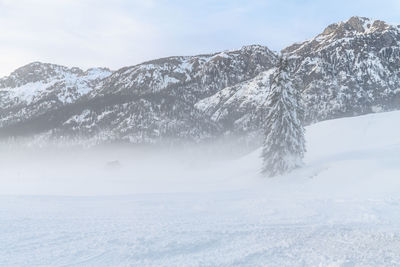 Snow covered mountain against sky