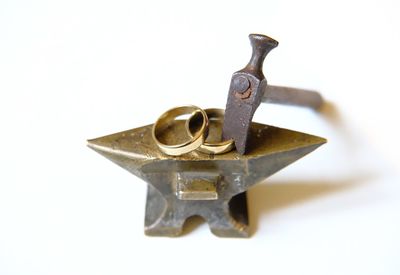 Close-up of padlock against white background