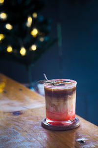 Iced coffee in glass on table