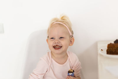 Portrait of cute girl with stuffed toy