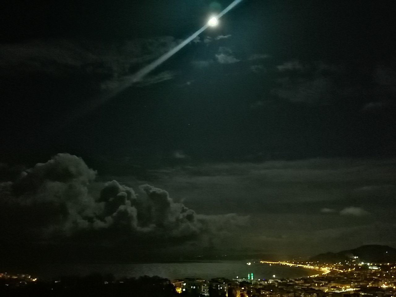 LOW ANGLE VIEW OF ILLUMINATED BUILDINGS AGAINST SKY