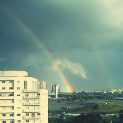 Rainbow over city