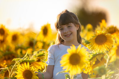Portrait of a girl with sunflower