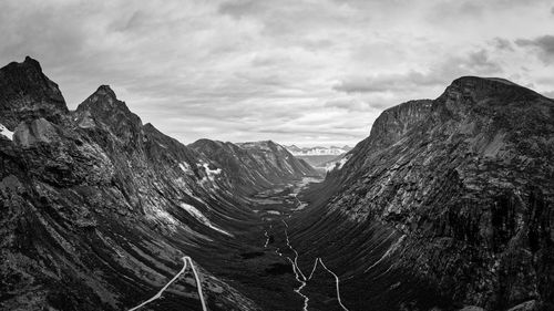 Panoramic view of rocky mountains against sky
