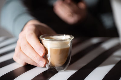 Close-up of coffee cup on table