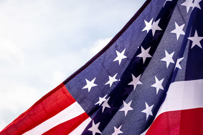 Close-up of flag against sky