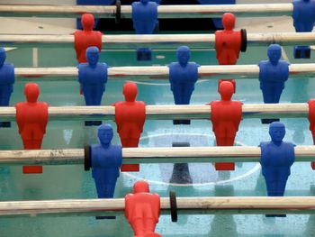 Close-up of figurine in row