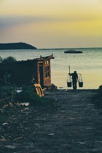 Scenic view of sea at sunset