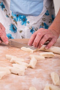 Midsection of woman preparing food