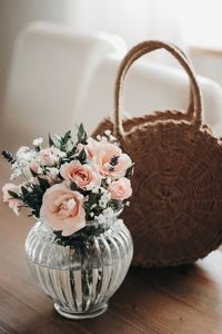 Close-up of flower vase on table